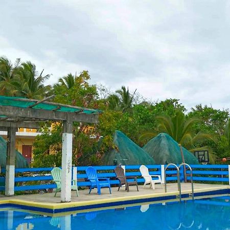 Lotus Sun & Waves Beach Resort Baler Bagian luar foto