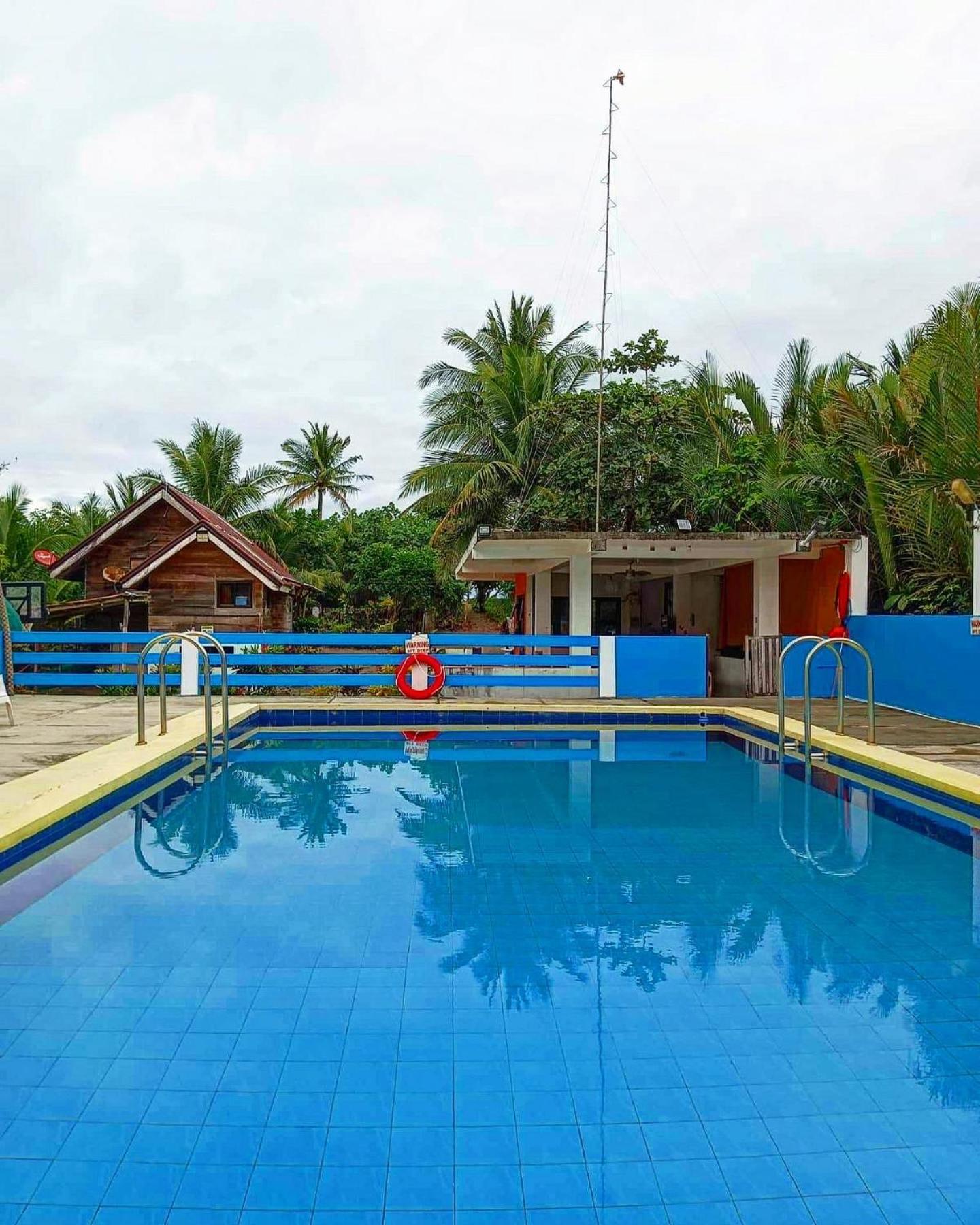 Lotus Sun & Waves Beach Resort Baler Bagian luar foto